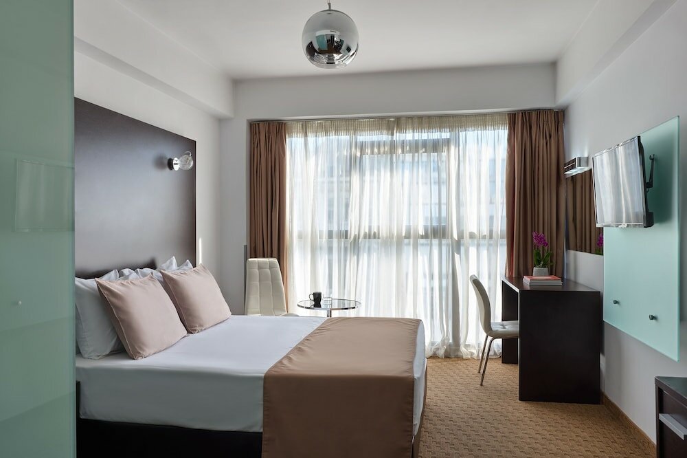 Фото Breeze Boutique Hotel