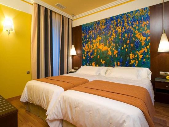 Фото Suites Gran VIA 44 Apartahotel