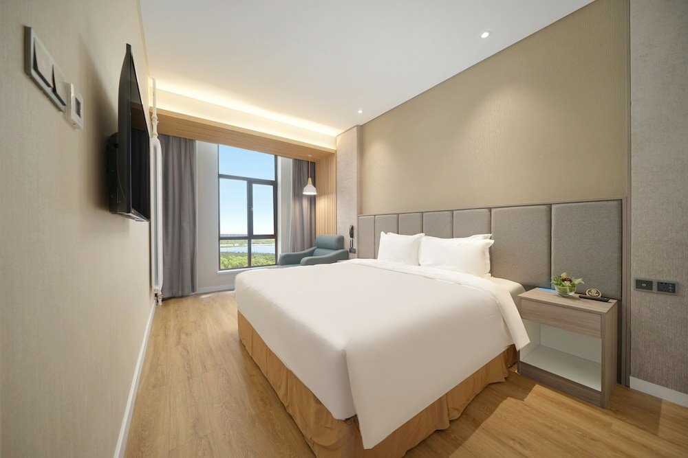 Фото Holiday Inn Express Harbin Songbei New District