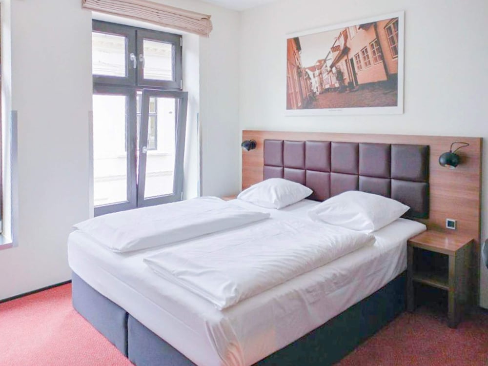 Фото Hotel Jomfru Ane