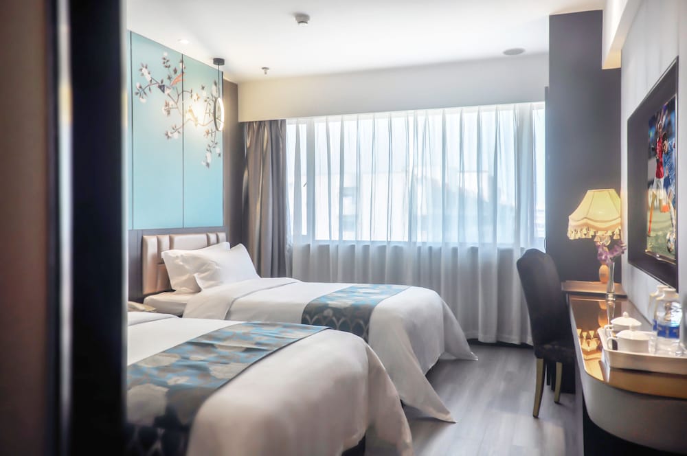 Фото Xiamen Hooray Hotel