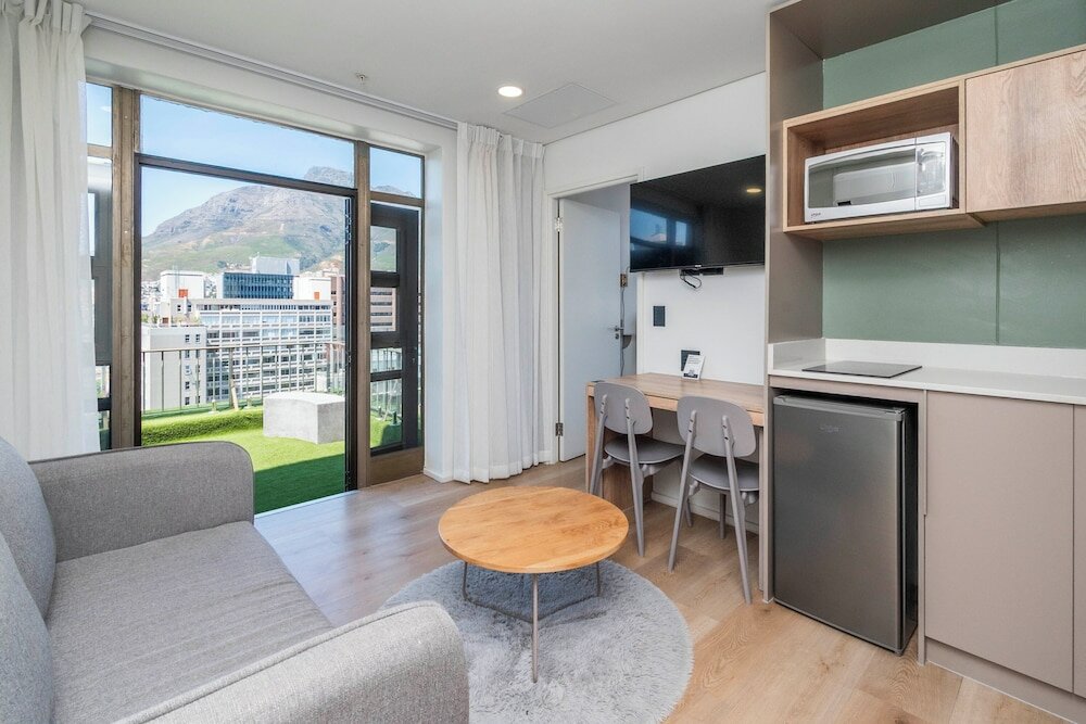 Фото Habitat Aparthotel by Totalstay