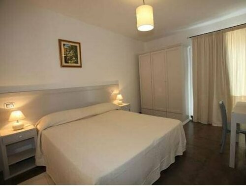 Гостиница Albergo Residenziale La Corte в Тортоли