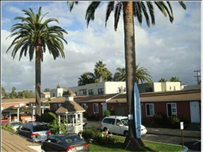 Гостиница Oceanside Inn and Suites в Оушенсайде