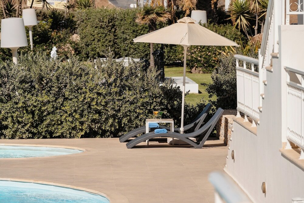 Фото Mitos Suites