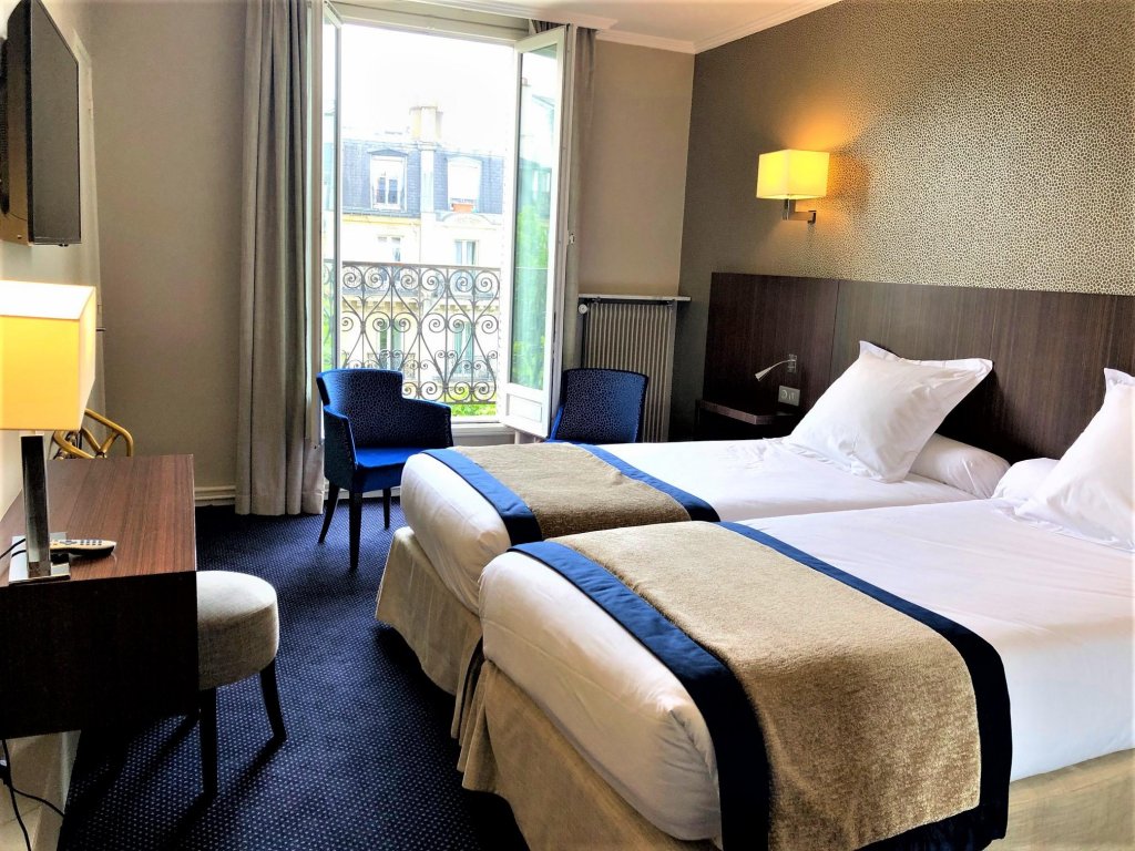 Фото Hotel De Suez