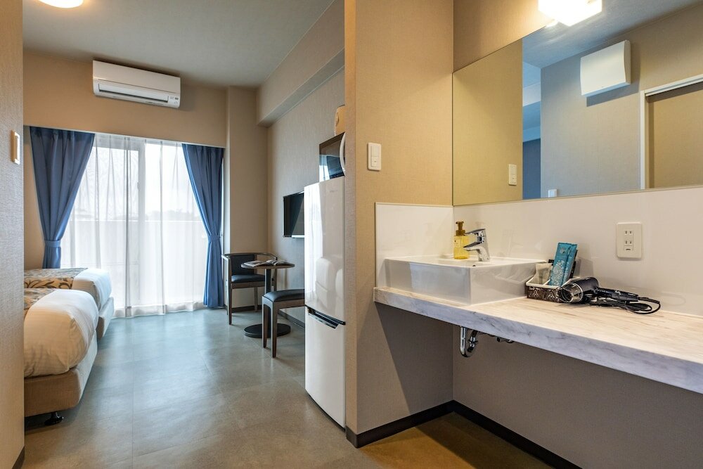 Фото Mr. Kinjo in Grand Blue Chatan