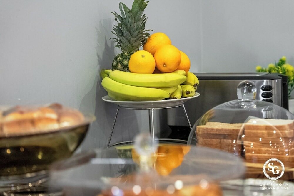 Фото Signature Guest Hotel