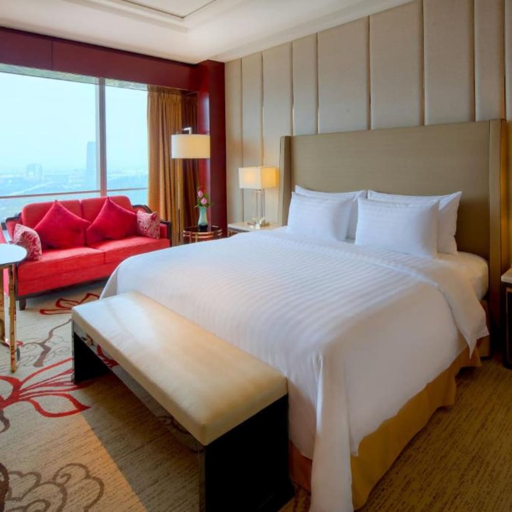 Фото Sanding New Century Grand Hotel Yiwu