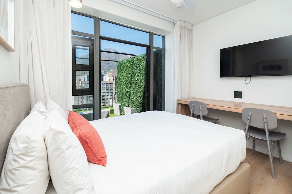 Фото Habitat Aparthotel by Totalstay