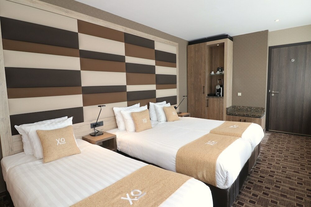 Фото Xo Hotels Blue Tower