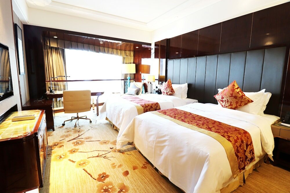 Фото Guangzhou Estandon Hotel