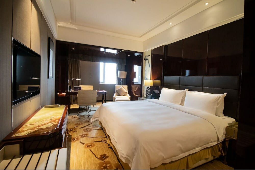 Фото Guangzhou Estandon Hotel