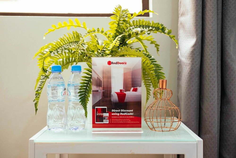 Фото Oyo 443 Maria Cristina Arcade Suites