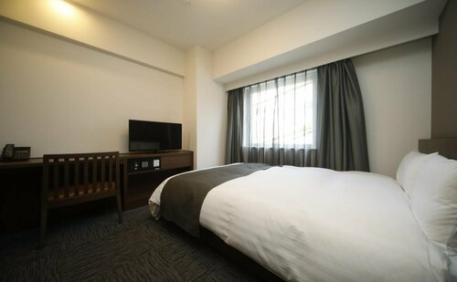 Гостиница Dormy Inn Oita Natural Hot Springs в Оите