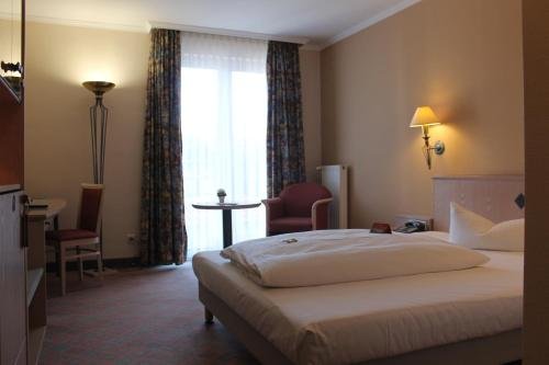 Фото Hotel am Schloß Apolda