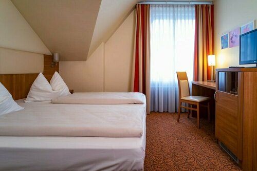 Гостиница Hotel am Stadtpark в Лангенфельде