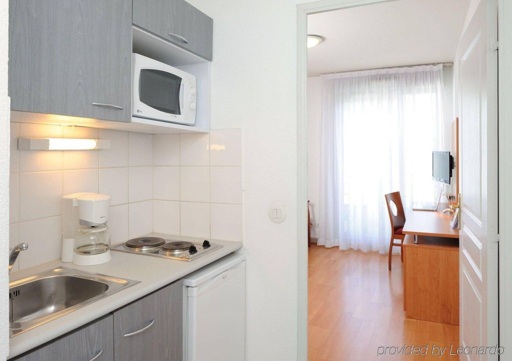 Фото Séjours & Affaires Lyon Park Lane