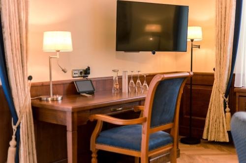 Фото Hotel & Gaststätte zum Erdinger Weißbräu