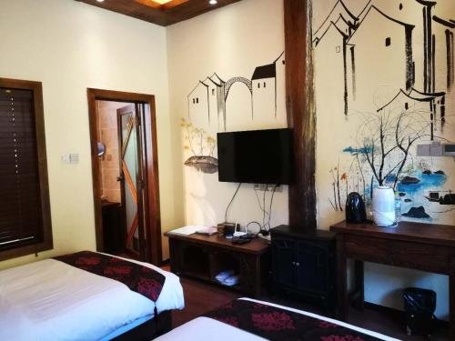 Фото The Ritz-Man Boutique Inn Lijiang