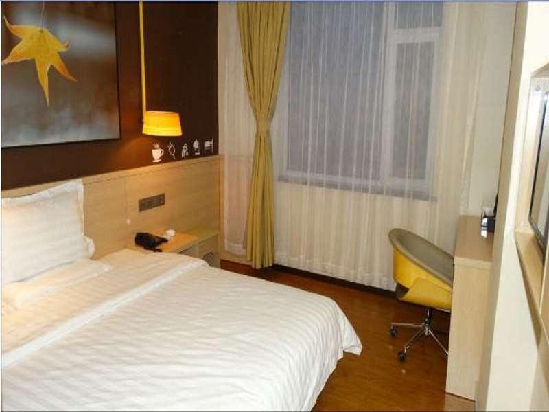 Фото Iu Hotel JInzhong Jiexiu Railway Station Branch