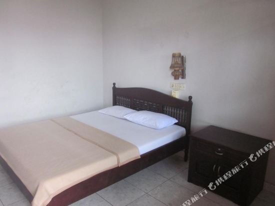 Фото Taman Mekar Beach Inn 2