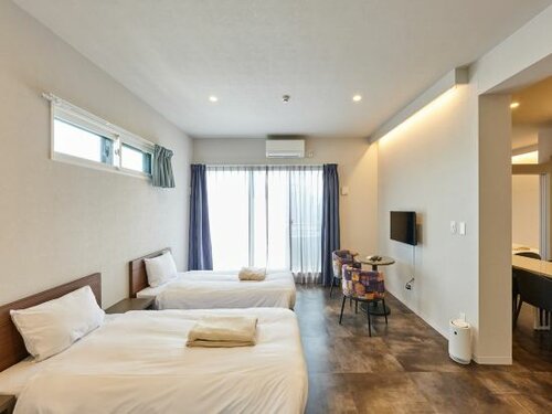 Апартаменты Uchi Chitose AJiTO в Титосэ