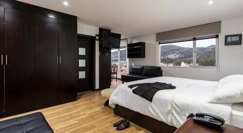 Гостиница Gaviota Apartments & Suites в Куэнке