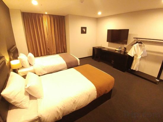 Фото Gangneung Tourist Hotel
