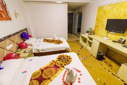 Фото Yangguan Hengye Hotel