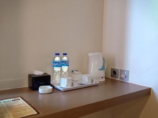 Фото Opi Indah Hotel