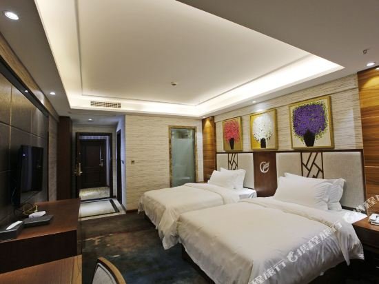 Фото Caifu Holiday Hotel