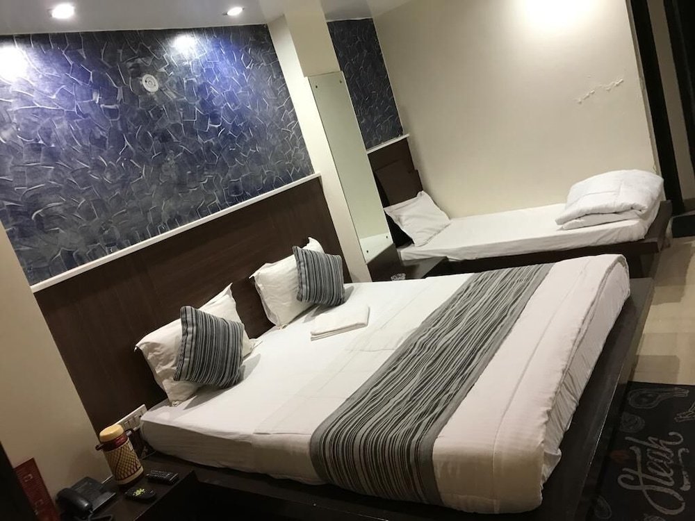 Фото Oyo 14710 Hotel Pallvi Palace