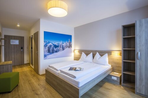 Внешний вид отеля Cooee alpin Hotel Kitzbüheler Alpen в Санкт-Йоханне ве Тироле, фото 2