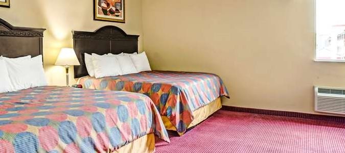 Фото Days Inn & Suites by Wyndham Jeffersonville In