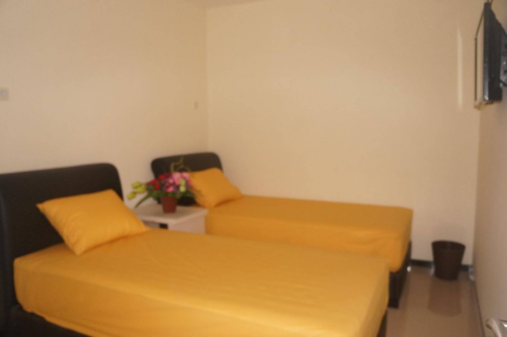 Фото Budget Guest House Tunas Mandiri Jaya