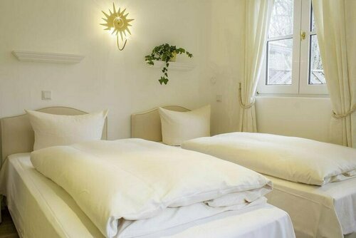 Гостиница Landhaus Hotel Wolfratshausen в Геретсриде