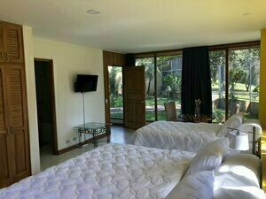 Гостиница La Casa de Cariari Al Golf в Эредии