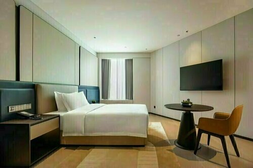 Гостиница Wyndham Grand Plaza Royale Yujia Anhua в Ияне