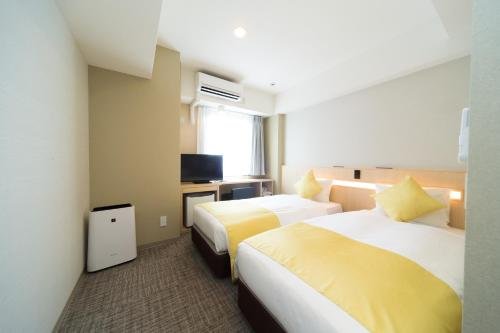 Фото Shinsaibashi Higashi Crystal Hotel