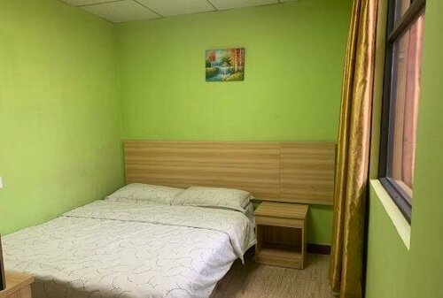 Гостиница Shenfa Hotel в Лунгане