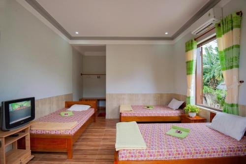 Фото Гостевой Дом Petunia Garden Homestay