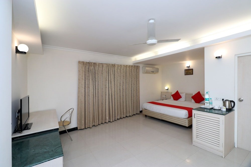Фото Capital O 1796 Grand Hotel