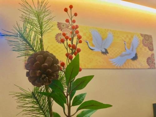 Фото Shinsaibashi Higashi Crystal Hotel