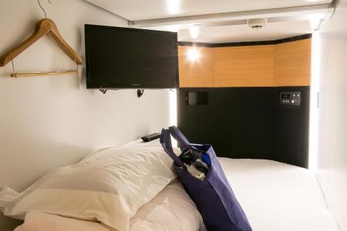 Фото Kanazawa Capsule Hotel Musashimachi