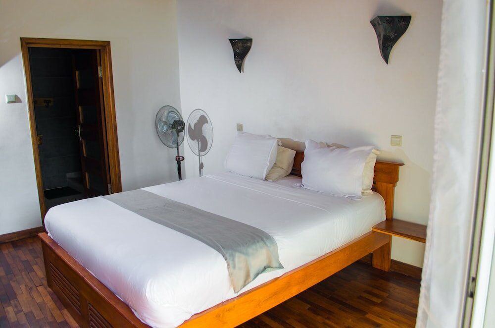 Фото Ikopa Hôtel