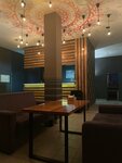 Lounger bar Шёпоты и Крики (ulitsa Lenina, 15А) ، مطعم يقدم الشيشة