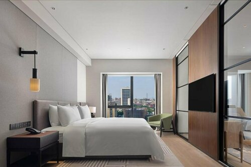 Гостиница New World Guangzhou Hotel
