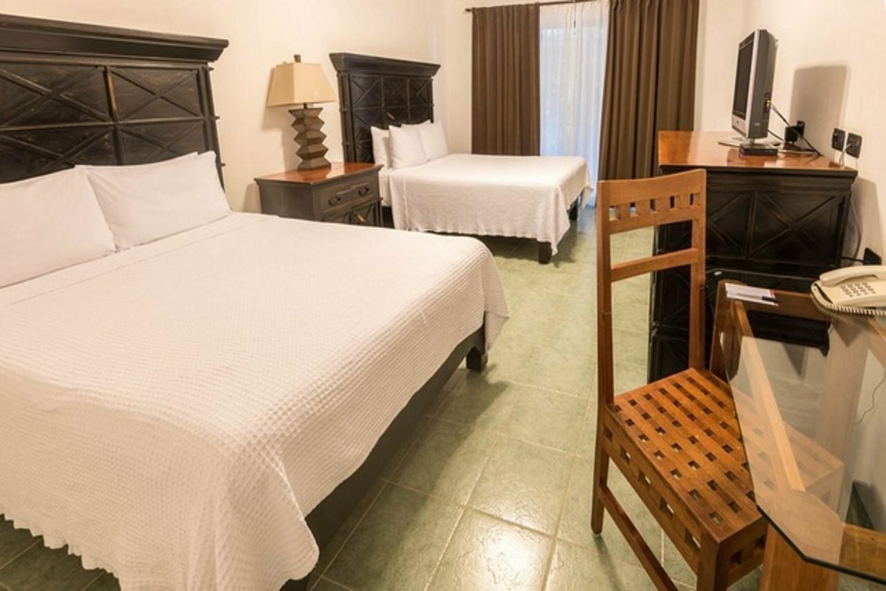 Фото Hacienda Paradise Hotel by Hospitality Wellbeing