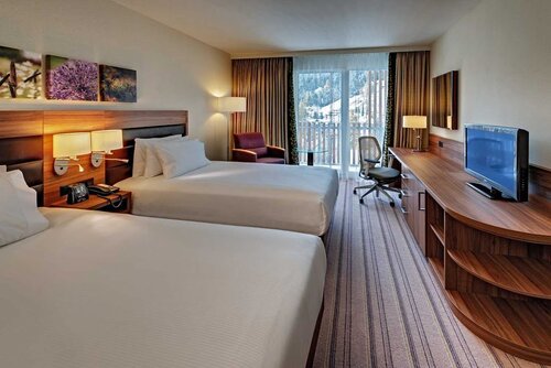 Внешний вид отеля Hilton Garden Inn Davos в Давосе, фото 2